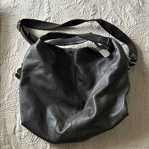 Furla genuine leather large hobo style handbag in a rich dark brown